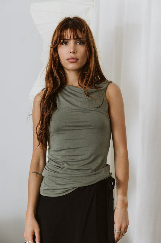 sleeveless top with twist shoulder