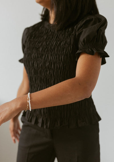 short sleeve smocked blouse